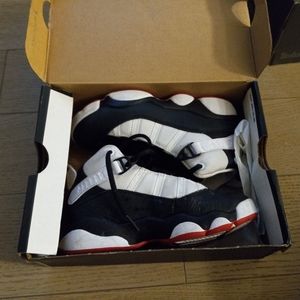 Kids jordans 6 rings size 1 color red white and black